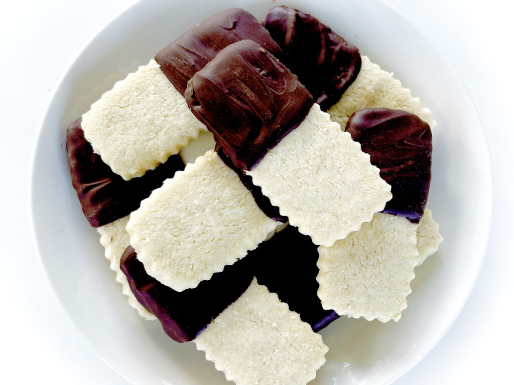 Gluten Free Shortbread Cookies stacked on plate.
