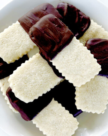Gluten Free Shortbread Cookies stacked on plate.