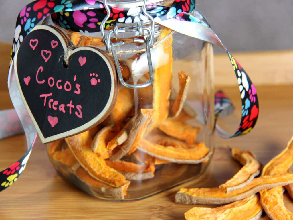 Sweet potato dog treats in a glass jar.
