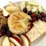 Gluten Free Baked Brie with Red and Green Apple Slices, Rosemary, Gluten Free Crackers, Blueberries, Grapes, Cherries