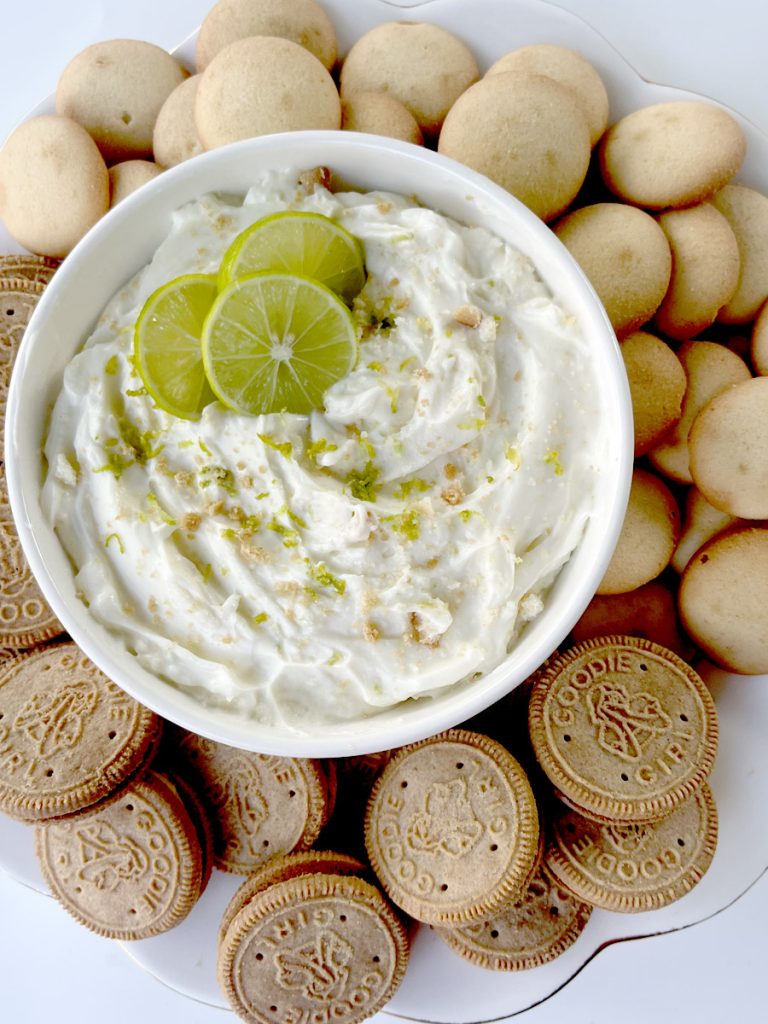 Key Lime Pie Dip Garnished with Key Limes and Served with Cookies